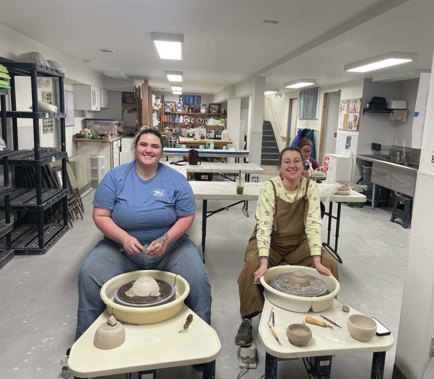 Emilie Springer/Homer News
Xochitl Harbison (left) and Jenna Gerrety (right) trim bowls in the Homer Council on the Arts studio<ins> in Homer, Alaska,</ins> on Friday, Oct. 25<ins>, 2024,</ins> in preparation for the Empty Bowl fundraiser.