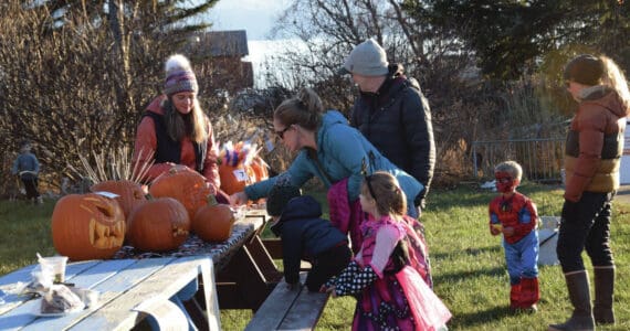 Delcenia Cosman/Homer News
Community members attending Homer Chamber of Commerce’s third annual Fall Fest vote for their favorite pumpkin created during the event’s Pumpkin Carving Contest on Saturday, Oct. 26.<ins>, 2024, at the Homer Chamber of Commerce and Visitor Center in Homer, Alaska</ins>