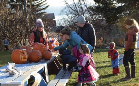 Delcenia Cosman/Homer News
Community members attending Homer Chamber of Commerce’s third annual Fall Fest vote for their favorite pumpkin created during the event’s Pumpkin Carving Contest on Saturday, Oct. 26.<ins>, 2024, at the Homer Chamber of Commerce and Visitor Center in Homer, Alaska</ins>