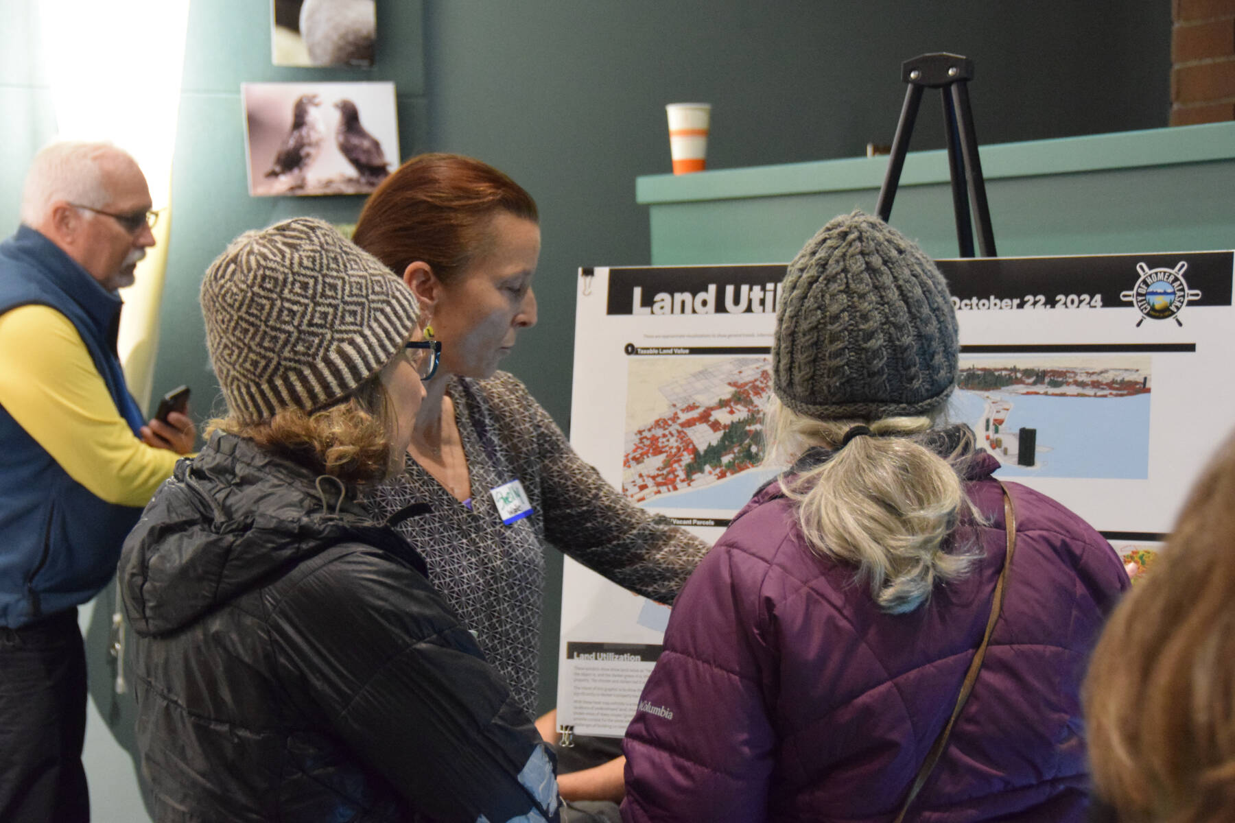 Agnew::Beck Consultant Project Leader Shelly Wade (center) answers questions from community members during a community work session on Tuesday, Oct. 22, 2024, at the Alaska Maritime National Wildlife Refuge Visitor Center in Homer, Alaska. (Delcenia Cosman/Homer News)