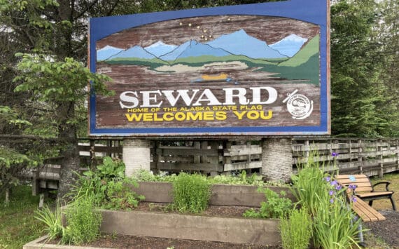 A sign welcomes visitors on July 7, 2021, in Seward, Alaska. (Photo by Jeff Helminiak/Peninsula Clarion)