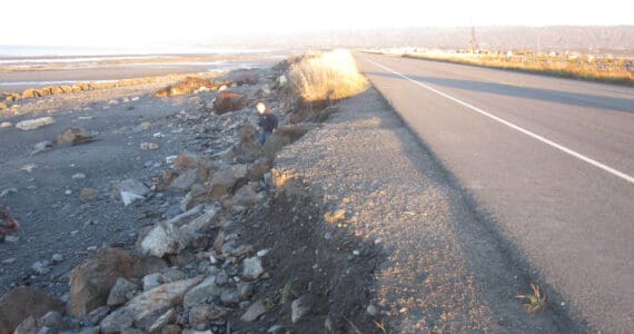 Erosion damage to the Homer Spit Road roadbed, caused by a severe winter storm event on Oct. 16, is photographed on Thursday, Oct. 17, 2024, in Homer, Alaska. The worst of the erosion occurred across the road from the Heritage RV campground office on the Spit. Photo by Bryan Hawkins