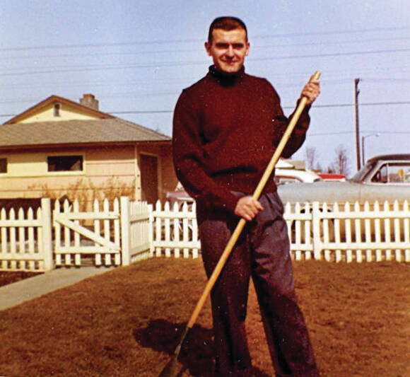 Photo courtesy of the Galliett Family Collection
Harold Galliett, the sole survivor of a 1965 Cordova Airlines crash into Tustumena Lake, is seen here raking his lawn in 1958.