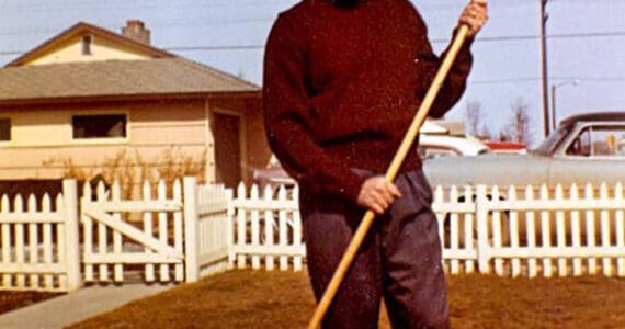 Harold Galliett, the sole survivor of a 1965 Cordova Airlines crash into Tustumena Lake, is seen here raking his lawn in 1958. (Photo courtesy of the Galliett Family Collection)