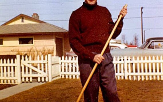 Harold Galliett, the sole survivor of a 1965 Cordova Airlines crash into Tustumena Lake, is seen here raking his lawn in 1958. (Photo courtesy of the Galliett Family Collection)