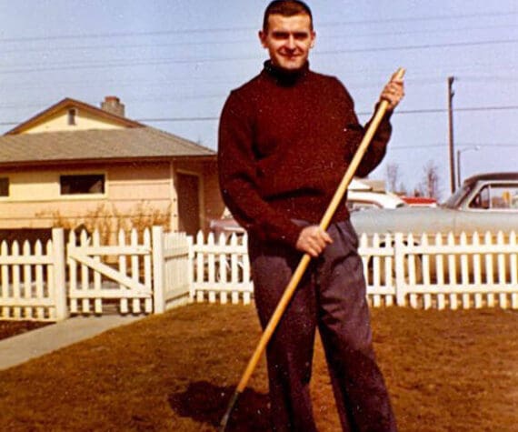 Harold Galliett, the sole survivor of a 1965 Cordova Airlines crash into Tustumena Lake, is seen here raking his lawn in 1958. (Photo courtesy of the Galliett Family Collection)