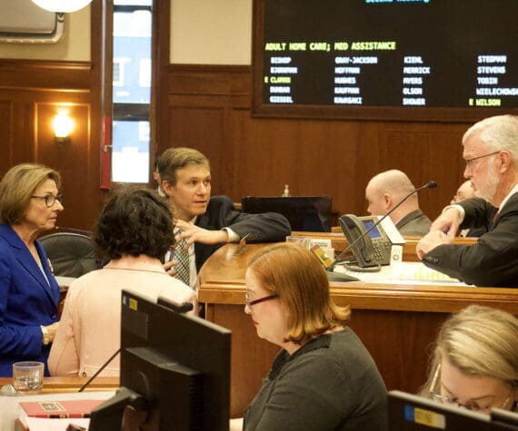 State Senate Majority Leader Cathy Giessel, R-Anchorage, left, confers with Senate President Gary Stevens, R-Kodiak, and other members during an April 24, 2024 floor session. (Mark Sabbatini / Juneau Empire file photo)