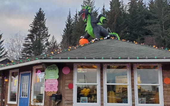 An inflatable dragon guards the rooftop of Bubbles Soda Parlor on Monday, Nov. 11, 2024, in Homer, Alaska. (Delcenia Cosman/Homer News)