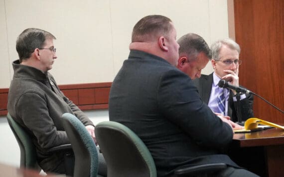 From left: Joseph Miller Jr. and Jason Woodruff, Alaska State Troopers charged with felony first-degree assault, appear with their lawyers, Clinton Campion and Matthew Widmer, for an arraignment at the Kenai Courthouse in Kenai, Alaska, on Thursday, Nov. 14, 2024. (Jake Dye/Peninsula Clarion)