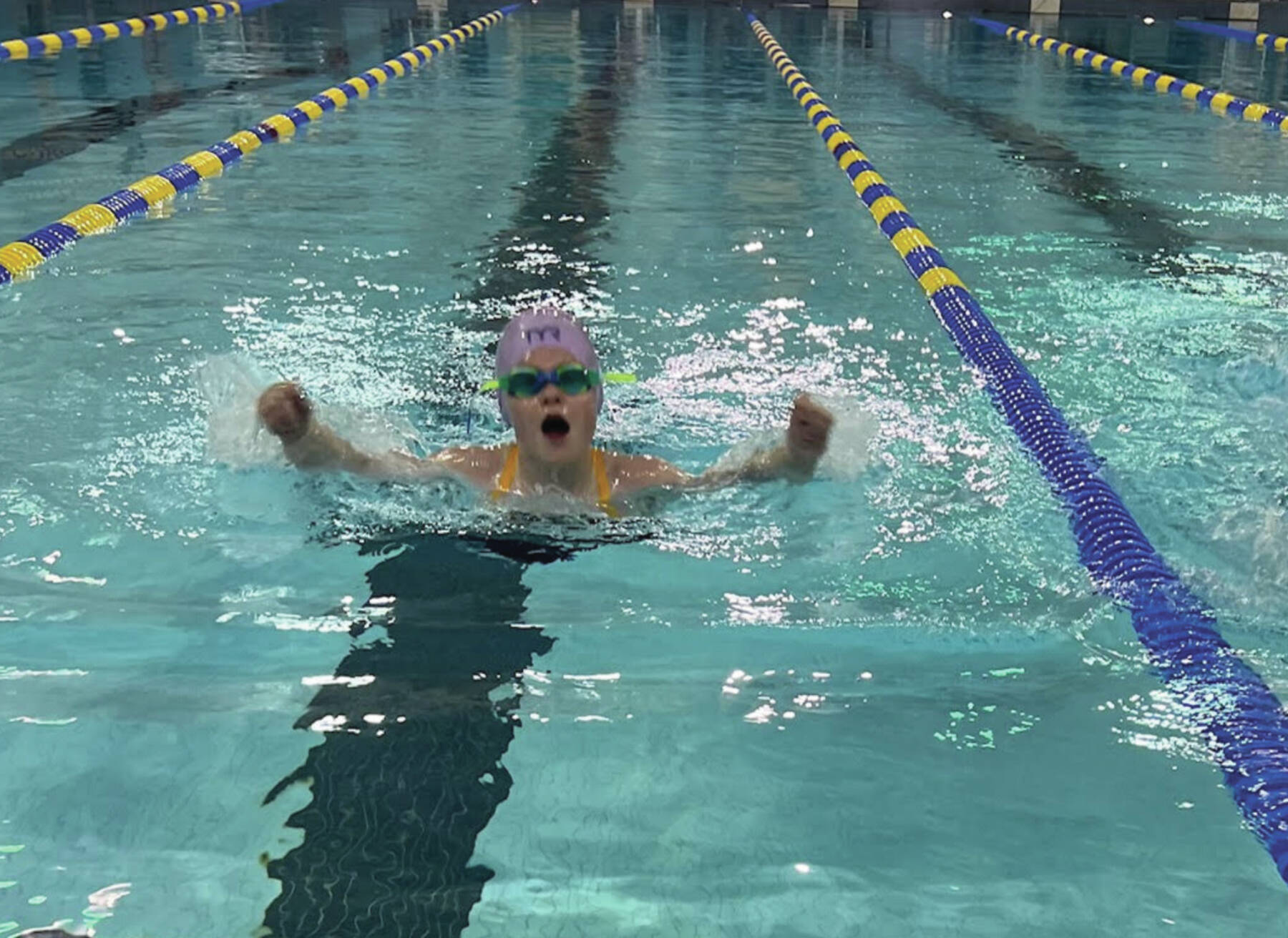 Ellowyn Hanson competes in the butterfly in the 8-and-under medley relay at the Kate Kuhns Memorial Pool on Saturday, Nov. 23<ins>,</ins><ins> 2024, in Homer, </ins><ins>Alaska</ins>. (Photo provided by Kachemak Kings)