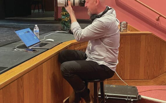 Photo by Emilie Springer/Homer News
Christopher Kincaid, sound technician, takes photos for the 2024 “Nutcracker” production at rehearsal on Sunday, Nov. 10<ins>, 2024,</ins> in the Homer Mariner Theatre<ins> in Homer, </ins><ins>Alaska</ins>.