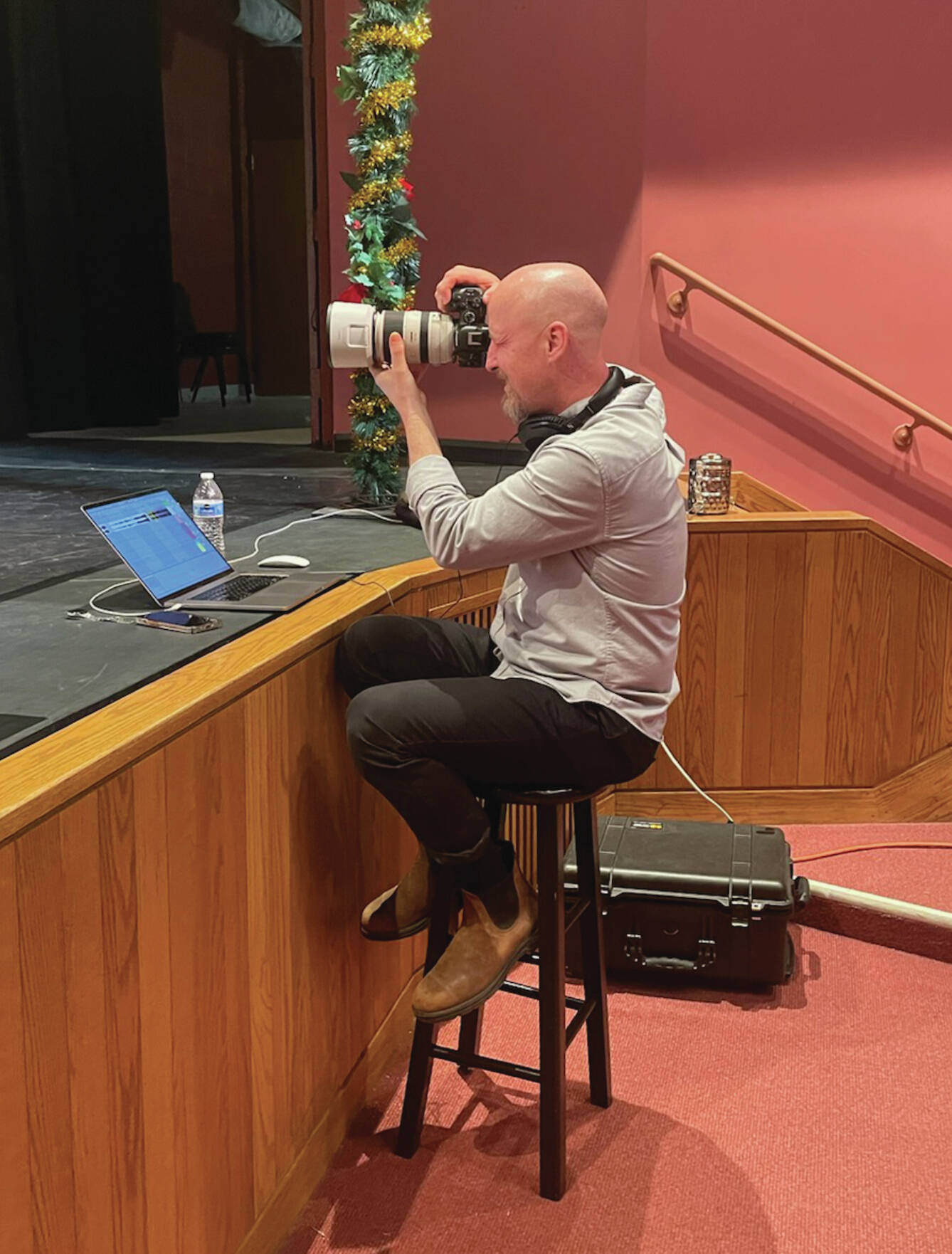 Photo by Emilie Springer/Homer News
Christopher Kincaid, sound technician, takes photos for the 2024 “Nutcracker” production at rehearsal on Sunday, Nov. 10<ins>, 2024,</ins> in the Homer Mariner Theatre<ins> in Homer, </ins><ins>Alaska</ins>.