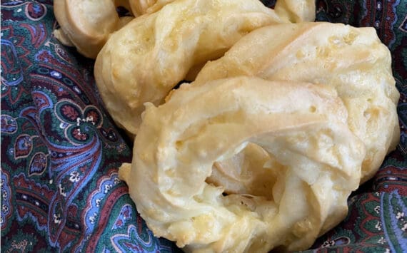 These light and savory cheesy ring puff snacks are piped pate a choux with a generous handful of shredded edam cheese. (Photo by Tressa Dale/Peninsula Clarion)