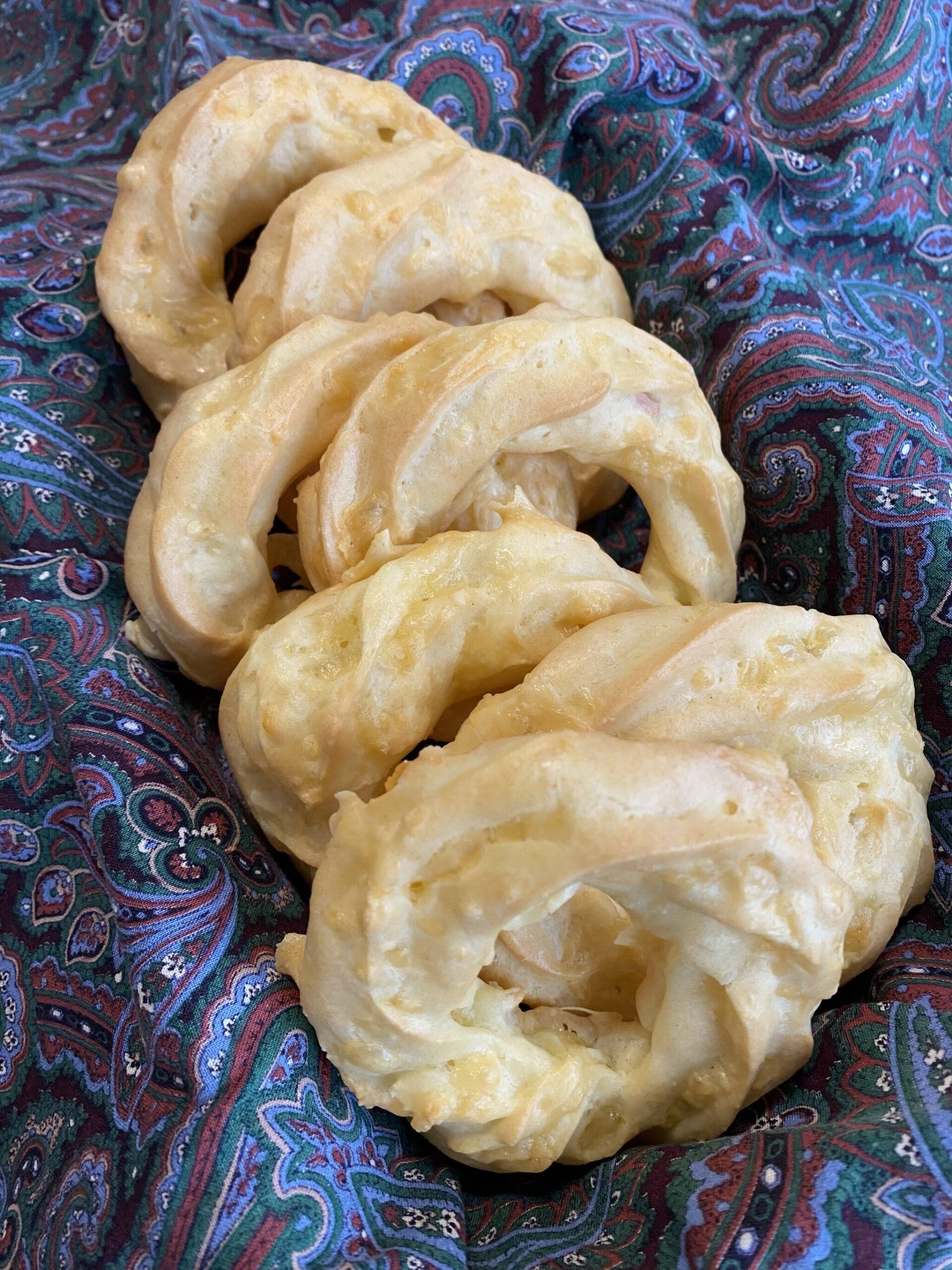 These light and savory cheesy ring puff snacks are piped pate a choux with a generous handful of shredded edam cheese. (Photo by Tressa Dale/Peninsula Clarion)