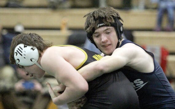 Soldotna’s Carson Cobb maintains a hold of Jett Connolly of the Student Wrestling Development Program during the 130-pound final of the Colony Invitational on Saturday, Nov. 23, 2024, at Colony High School in Palmer. (Photo by Jeremiah Bartz/Frontiersman)