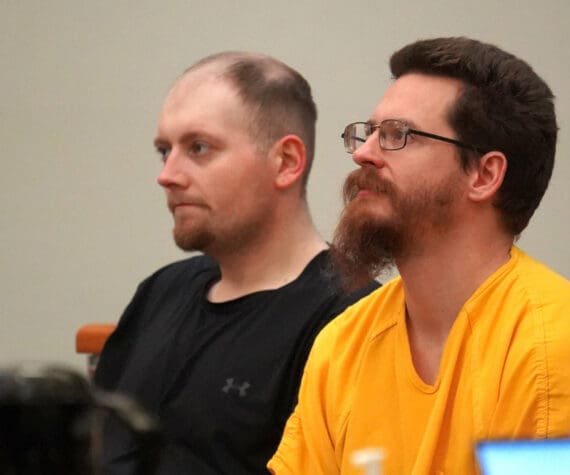 Josiah Kelly, right, appears for a superior court arraignment at the Kenai Courthouse in Kenai, Alaska, on Tuesday, Nov. 26, 2024. (Jake Dye/Peninsula Clarion)