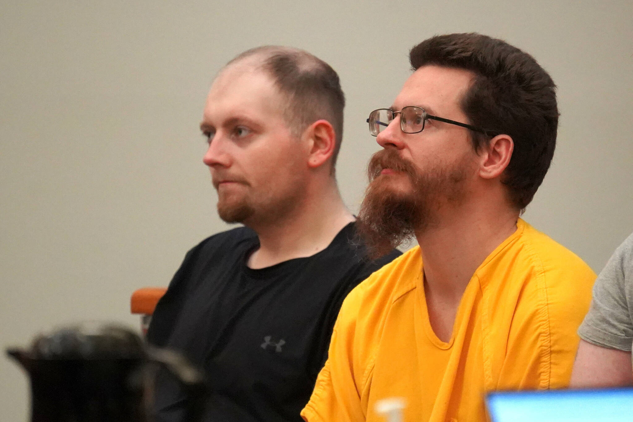 Josiah Kelly, right, appears for a superior court arraignment at the Kenai Courthouse in Kenai, Alaska, on Tuesday, Nov. 26, 2024. (Jake Dye/Peninsula Clarion)