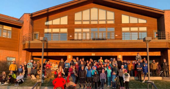 Turkey Trot participants gather for a photo in front of Homer High School, which served as the race’s starting and finish line, on Thursday, Nov. 28, 2024, in Homer, Alaska. More than 120 community members participated in the race, which was co-sponsored by the Kachemak Bay Running Club, and over 300 non-perishable food items were donated to the Homer Food Pantry after the event. Photo courtesy of Matt Smith