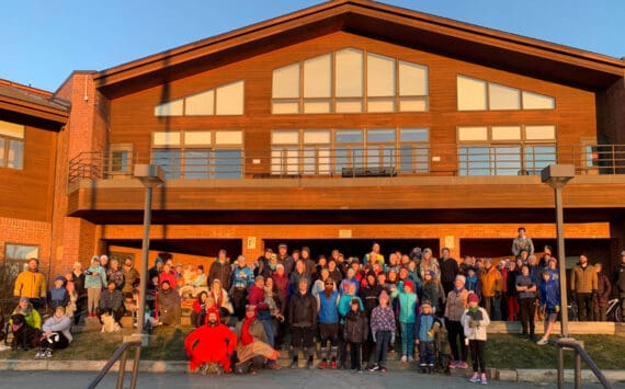 Turkey Trot participants gather for a photo in front of Homer High School, which served as the race’s starting and finish line, on Thursday, Nov. 28, 2024, in Homer, Alaska. More than 120 community members participated in the race, which was co-sponsored by the Kachemak Bay Running Club, and over 300 non-perishable food items were donated to the Homer Food Pantry after the event. Photo courtesy of Matt Smith