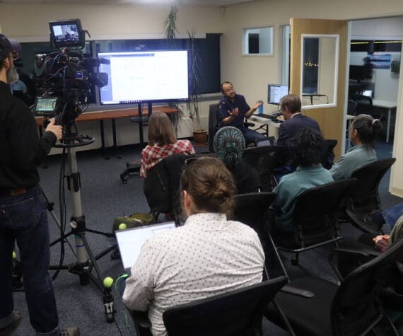 Media members and other observers gather at the Alaska Division of Elections office on Wednesday, Nov. 20, 2024,	as the results of all ballots, including ranked choice tabulations, were announced. (Mark Sabbatini / Juneau Empire)