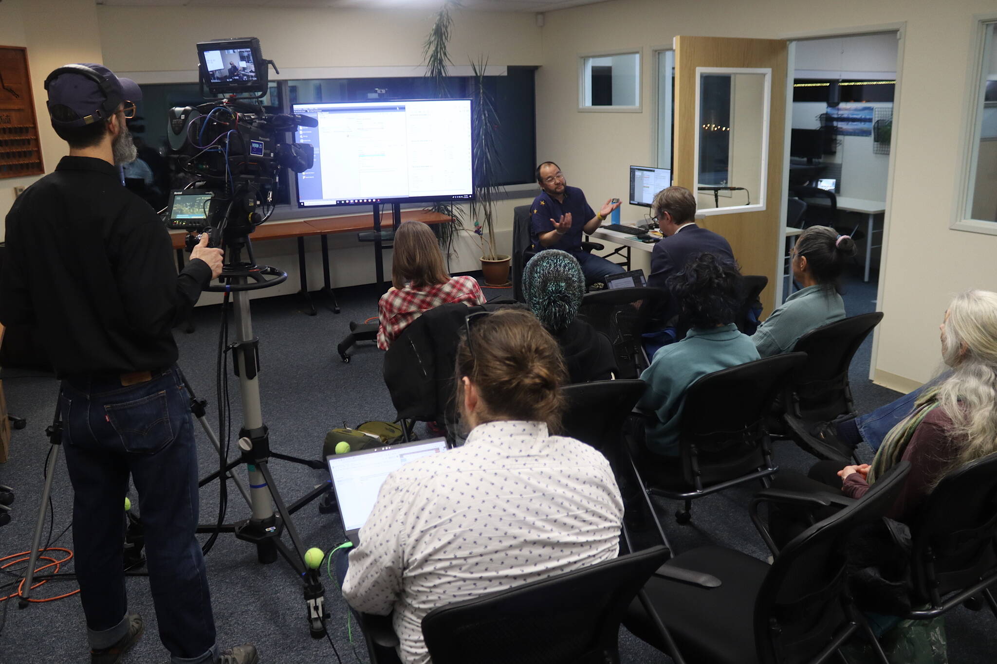 Media members and other observers gather at the Alaska Division of Elections office on Wednesday, Nov. 20, 2024,	as the results of all ballots, including ranked choice tabulations, were announced. (Mark Sabbatini / Juneau Empire)