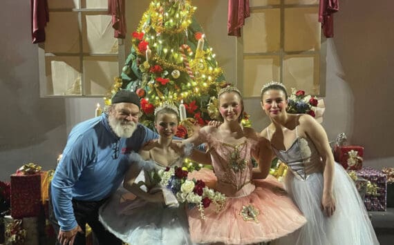 Emilie Springer/ Homer News
Ken Castner with Nutcracker senior dancers Natalia Sherwood, Tiya Martushev and Sofia Loboy in front of the Stahlbaum Christmas tree after last Sunday’s matinee performance.