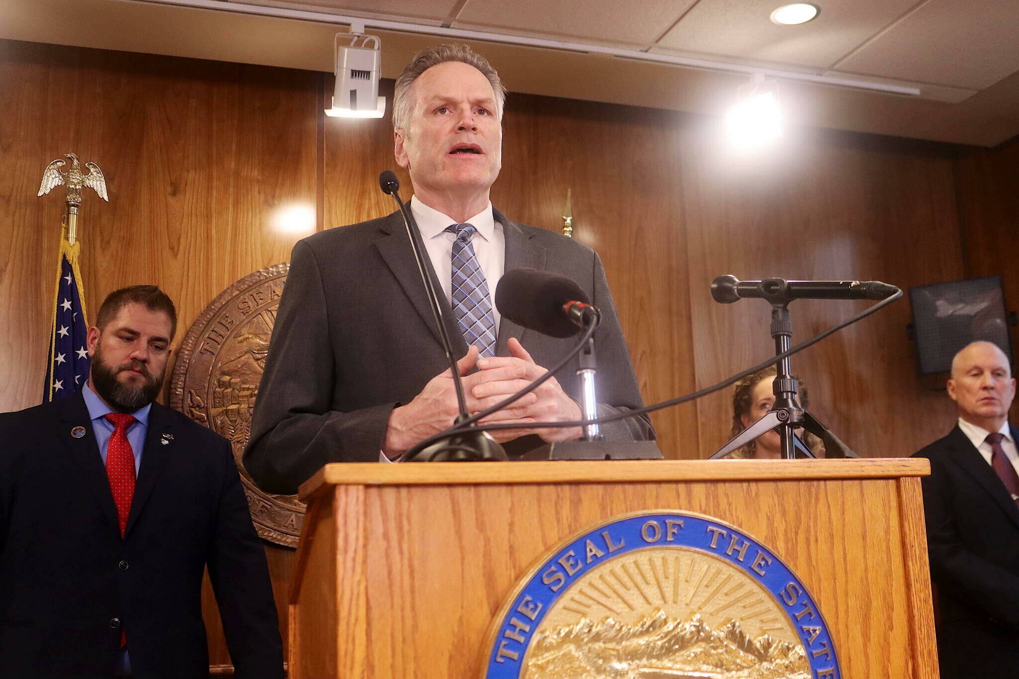 Gov. Mike Dunleavy explains details of his proposed state budget for next year during a press conference Dec. 12 at the Alaska State Capitol. (Mark Sabbatini / Juneau Empire file photo)