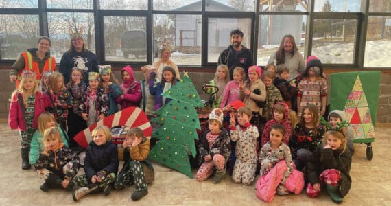 Homer’s Little Fireweed Academy students grades K-2, teachers and staff deliver donations to Homer’s Food Pantry at the Homer Methodist Church on Friday, Dec. 20. Emilie Springer/ Homer News