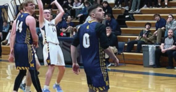 Preston Stonislov, 10, shoots in the Mariner alumni game Saturday<ins>, Dec. 21, 2024,</ins> in the Homer High School Gym. Emilie Springer/ Homer News