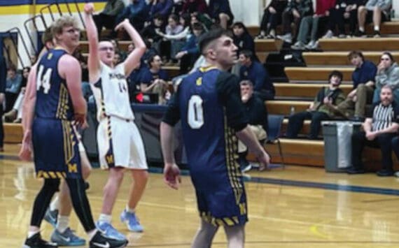 Preston Stonislov, 10, shoots in the Mariner alumni game Saturday<ins>, Dec. 21, 2024,</ins> in the Homer High School Gym. Emilie Springer/ Homer News