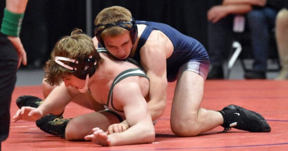 Soldotna’s Michael Dickinson wrestles to a 10-1 major decision against Colony’s Tristen Mayer in the final at 152 pounds at the Division I state wrestling tournament Saturday, Dec. 21, 2024, at the Alaska Airlines Center in Anchorage, Alaska. (Photo by Jeff Helminiak/Peninsula Clarion)