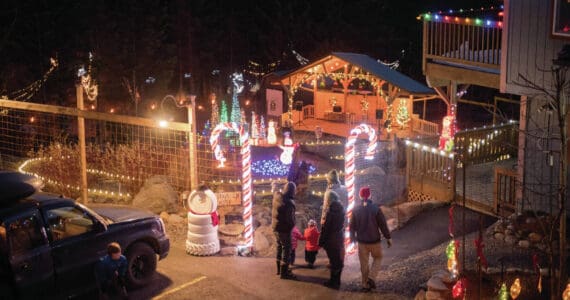 Homer families visit the Bear Creek Winery Garden of Lights, held Dec. 13-14 and Dec. 20-21<ins>, 2024, in Homer, Alaska</ins>. Photo courtesy of Louis Maurer