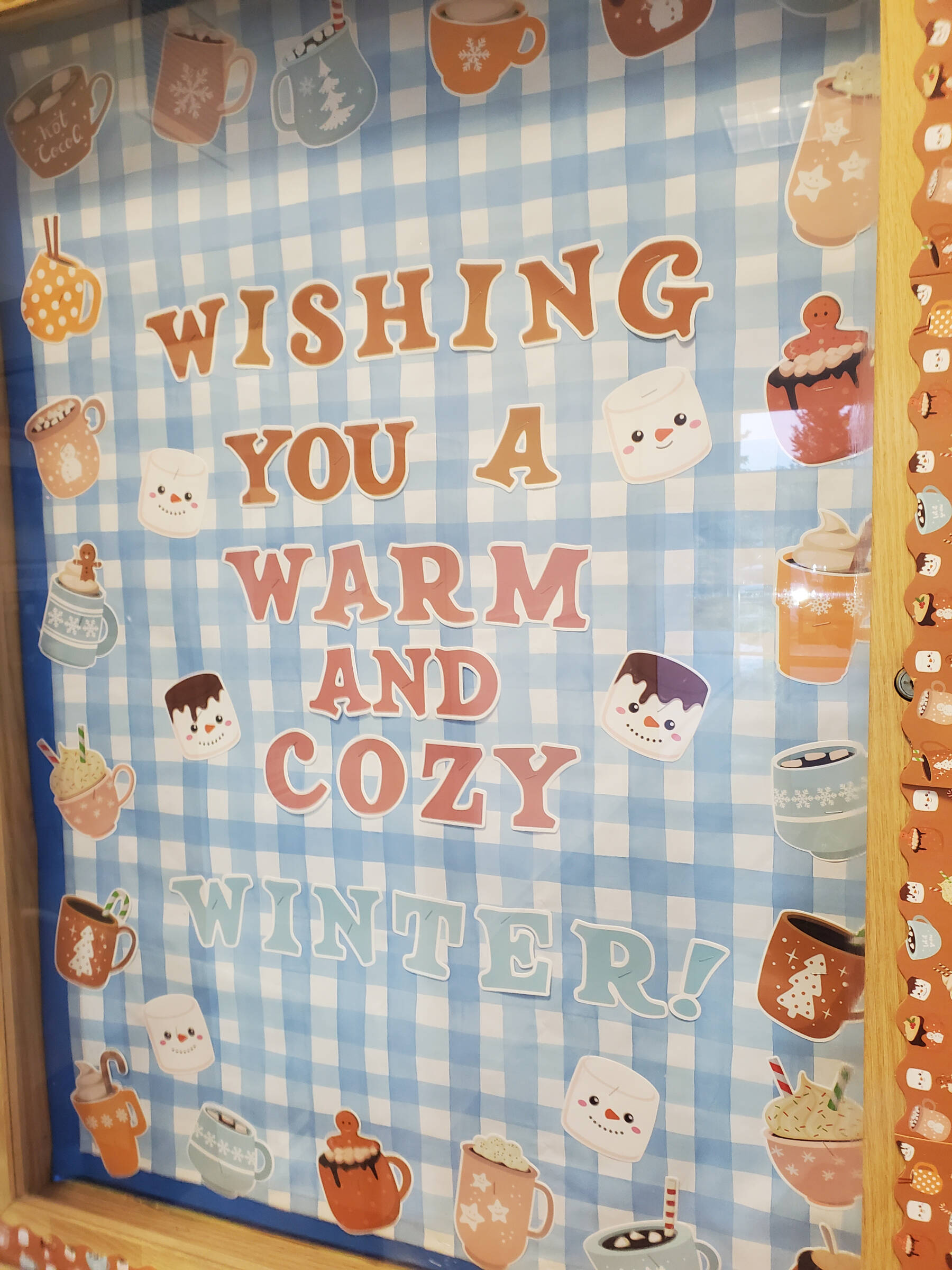 A display at the Anchor Point Post Office wishes community members a warm and cozy winter on Monday, Dec. 30, 2024, in Anchor Point, Alaska. (Delcenia Cosman/Homer News)