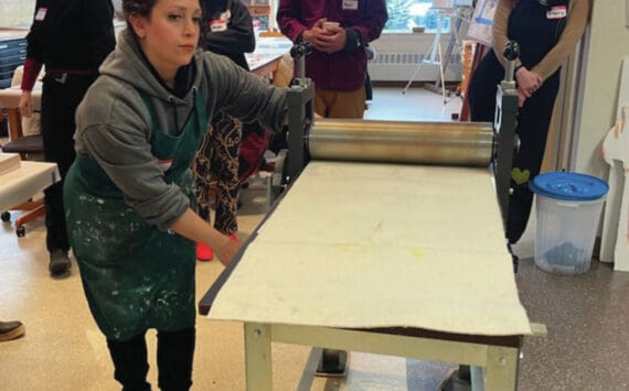 Emilie Springer/Homer News
Bunnell’s January Artist-in-Residence Maryam Ghasempour Siahgaldeh demonstrates printmaking skills for students at Kachemak Bay Campus on Saturday, Jan. 4.