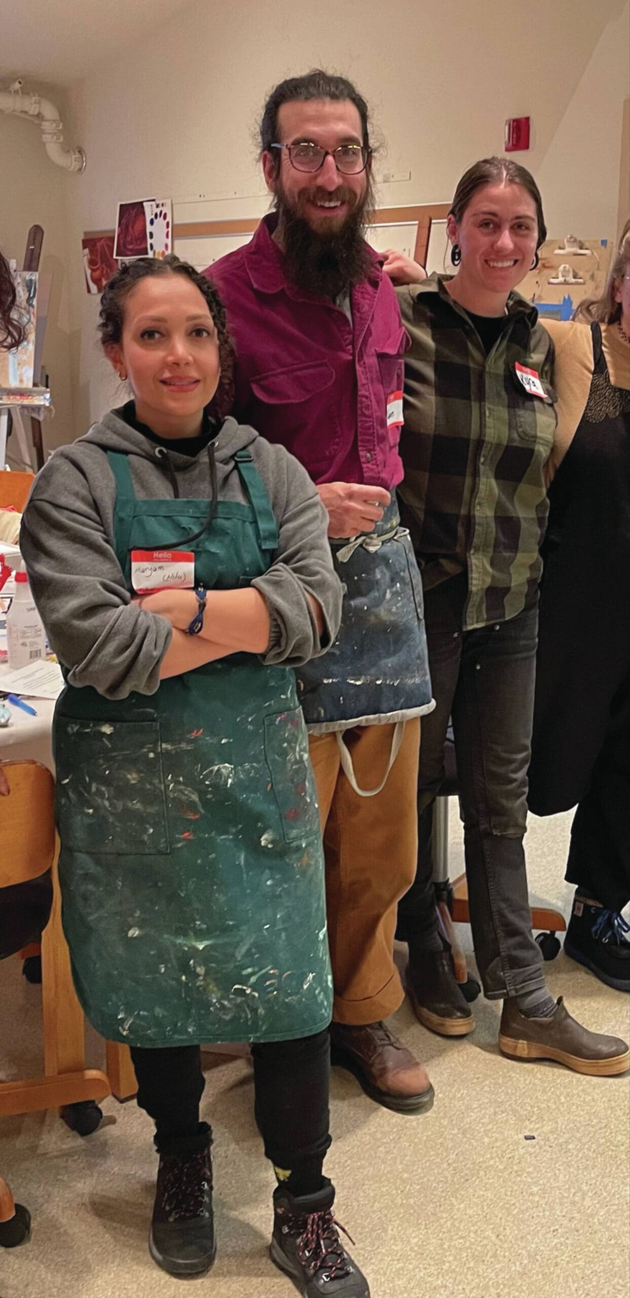 Maryam Ghasempour Siahgaldeh poses with students in her monoprint workshop at the Kachemak Bay Campus on Saturday, Jan. 4. Emilie Springer/ Homer News