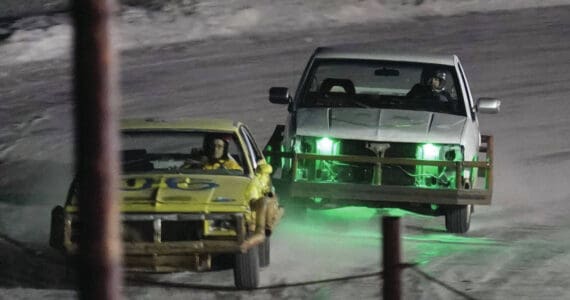 Jake Dye/Peninsula Clarion
Racers vie for the lead in the second race of the Kenai Peninsula Ice Racing season at Twin City Raceway in Kenai on Tuesday, Dec. 31.