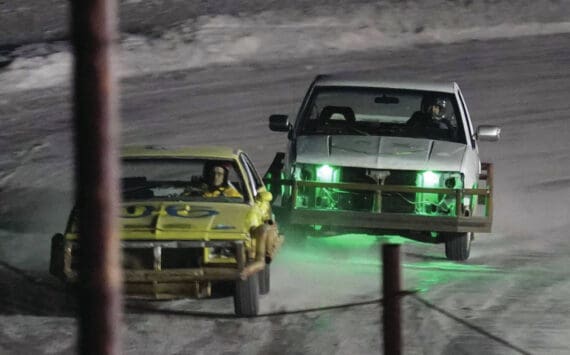 Jake Dye/Peninsula Clarion
Racers vie for the lead in the second race of the Kenai Peninsula Ice Racing season at Twin City Raceway in Kenai on Tuesday, Dec. 31.