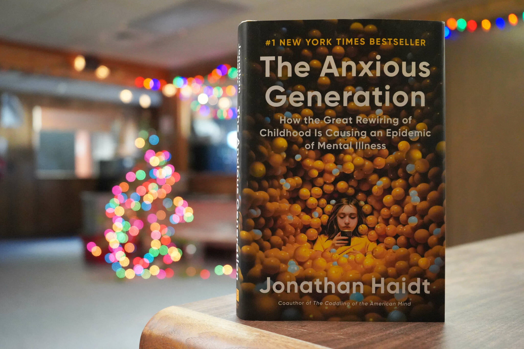 Jake Dye/Peninsula Clarion
A copy of “The Anxious Generation: How the Great Rewiring of Childhood is Causing an Epidemic of Menal Illness” rests on a desk in the Peninsula Clarion newsroom in Kenai, Alaska, on Tuesday, Jan. 7, 2024.