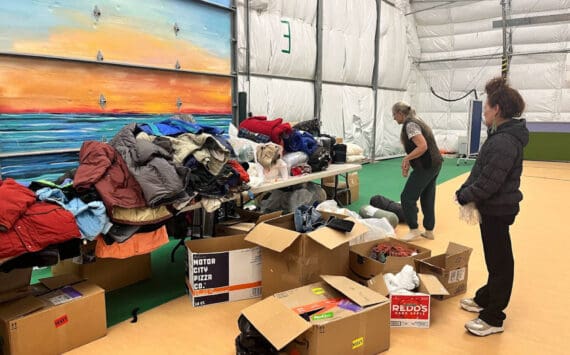 Volunteers sort winter gear prior to the start of the annual Community Resource Connect on Tuesday, Jan. 30, 2024, at the SPARC in Homer, Alaska. Photo provided by Derotha Ferraro