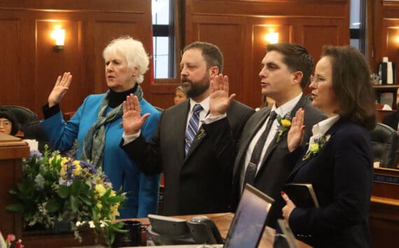 From left: Alaska House Reps. Louise Stutes, R-Kodiak; Bill Elam, R-Nikiski; Justin Ruffridge, R-Soldotna; and Sarah Vance, R-Homer; take the oath of office at the Alaska Capitol on Tuesday, Jan. 21, 2025, in Juneau, Alaska. (Photo by Mark Sabbatini/Juneau Empire)