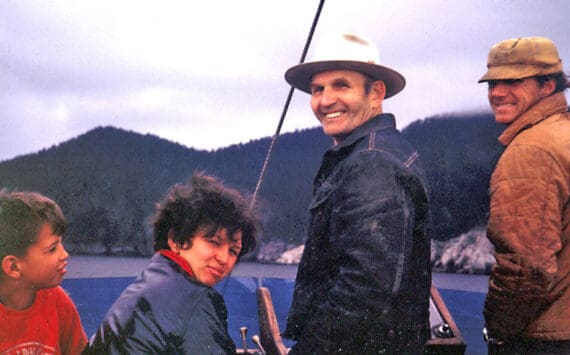 Poopdeck Platt fishes with friends in this undated photograph. (Photo courtesy of Ken Moore)